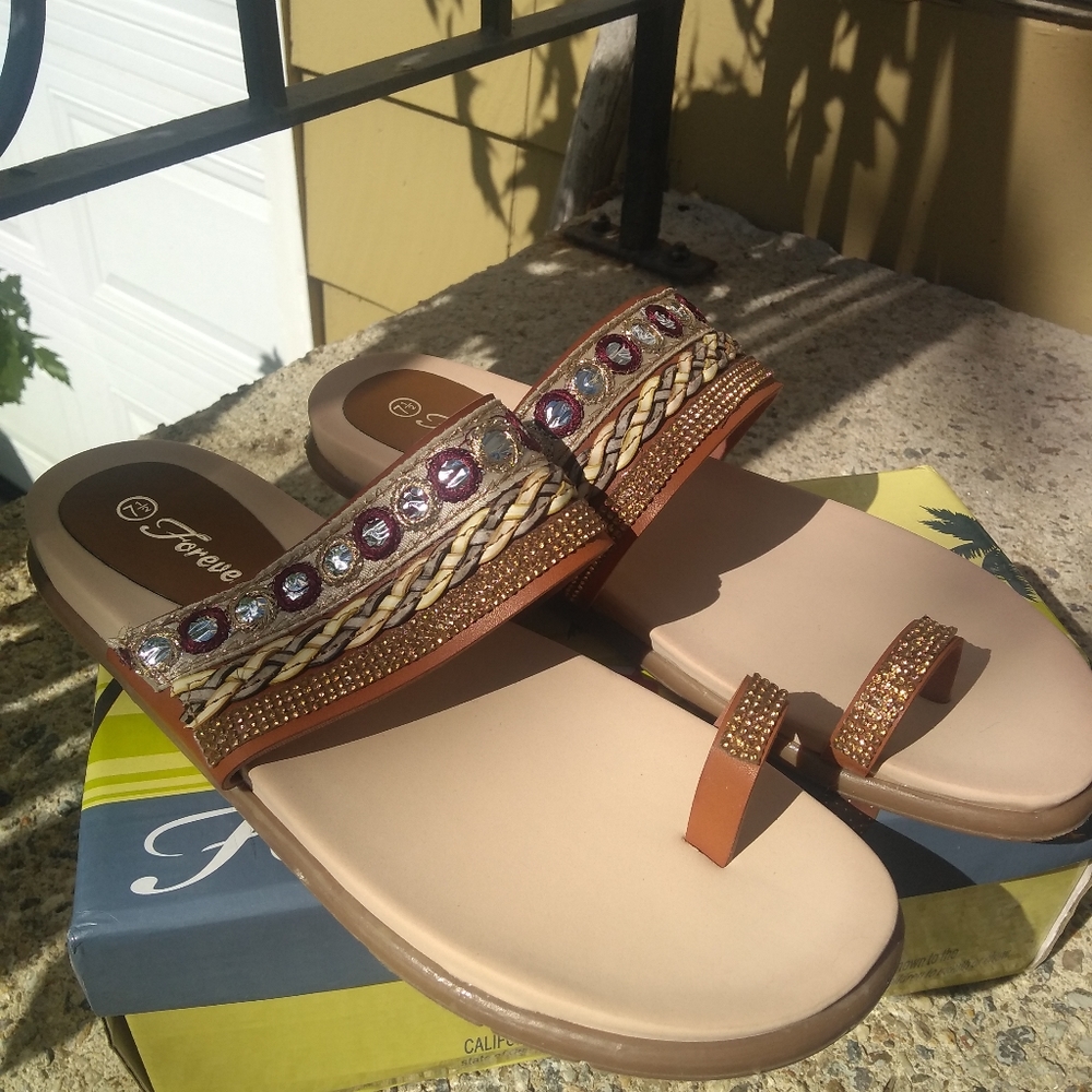 Tan sandals. Size 7.5M.